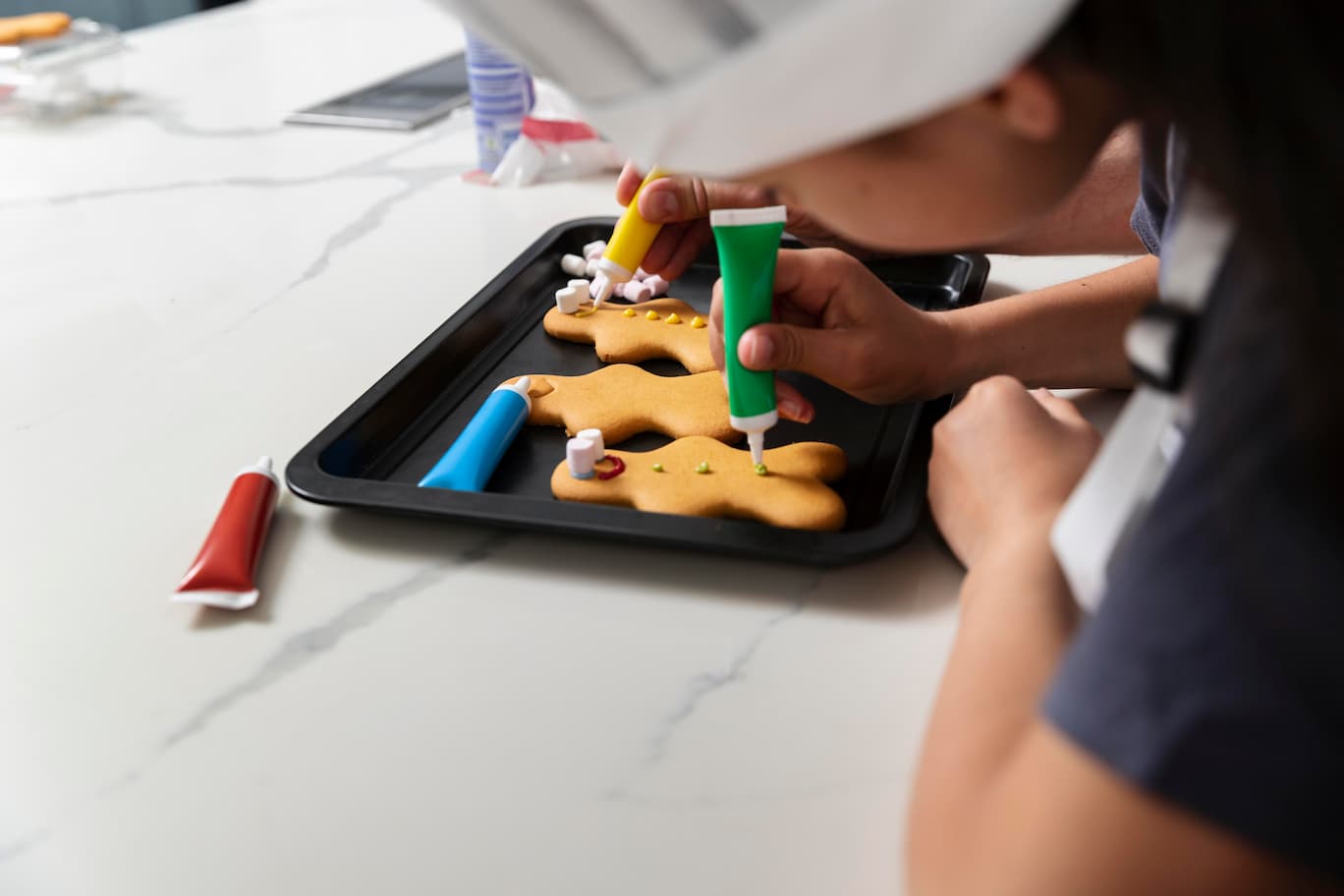 little-girl-doing-gingerbread-cookies